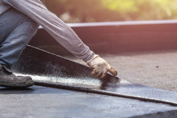 Professional Basement Waterproofing technician working in Spencerville, MD